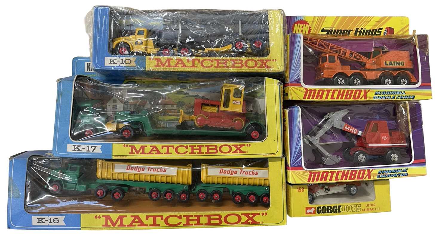 A group of Matchbox die-cast vehicle packs, from the K / Superkings series
