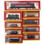 A mixed lot of boxed Hornby 00 gauge rolling stock.