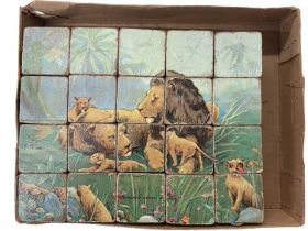 A set of vintage wooden puzzle blocks with papered designs, size of each block approximately: