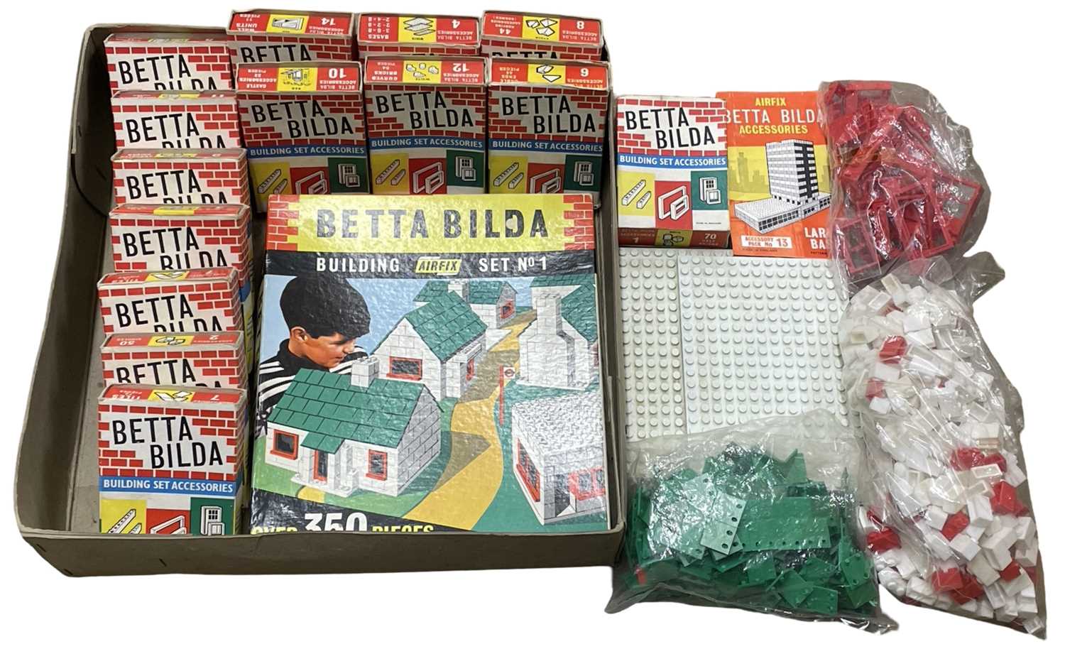 A collection of various vintage Betta Bilda kit boxes and bricks