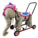 A vintage Merrythought ride-on / walker formed as a Circus elephant