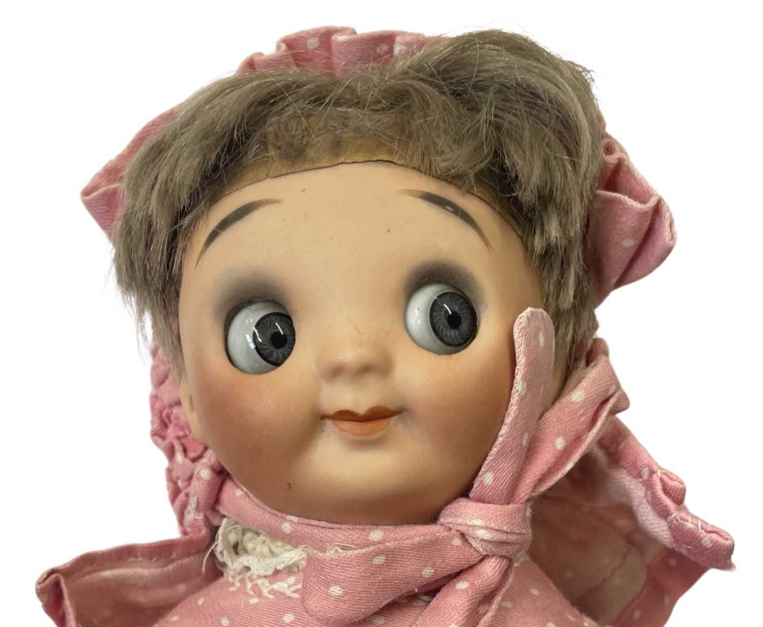 A bisque head Gebruder Heubach Einco 'Googly eye' doll, in pink spotted dress, woollen under- - Bild 2 aus 3