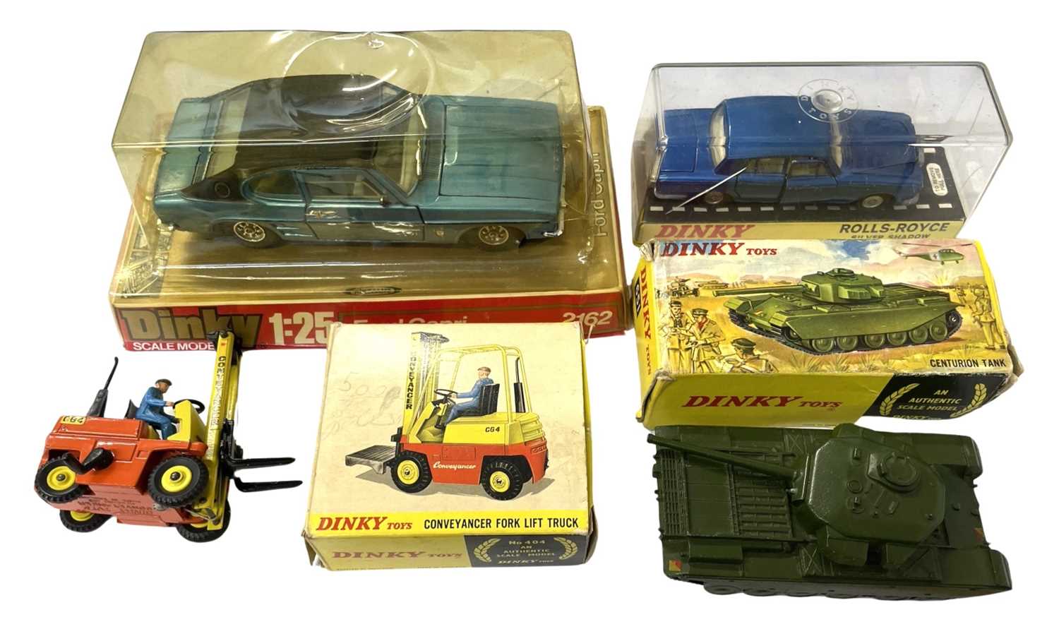 Four boxed die-cast Dinky vehicles, to include: - Rolls Royce Silver Shadow - Centurion Tank -