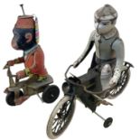 A pair of vintage Chinese tinplate toys, formed as a performing monkey and a gent on a bicycle (a/