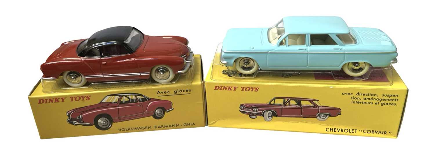 A pair of boxed Atlas Editions reproduction Dinky Toys, to include: - 24M Volkswagen Karmann-
