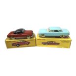 A pair of boxed Atlas Editions reproduction Dinky Toys, to include: - 24M Volkswagen Karmann-