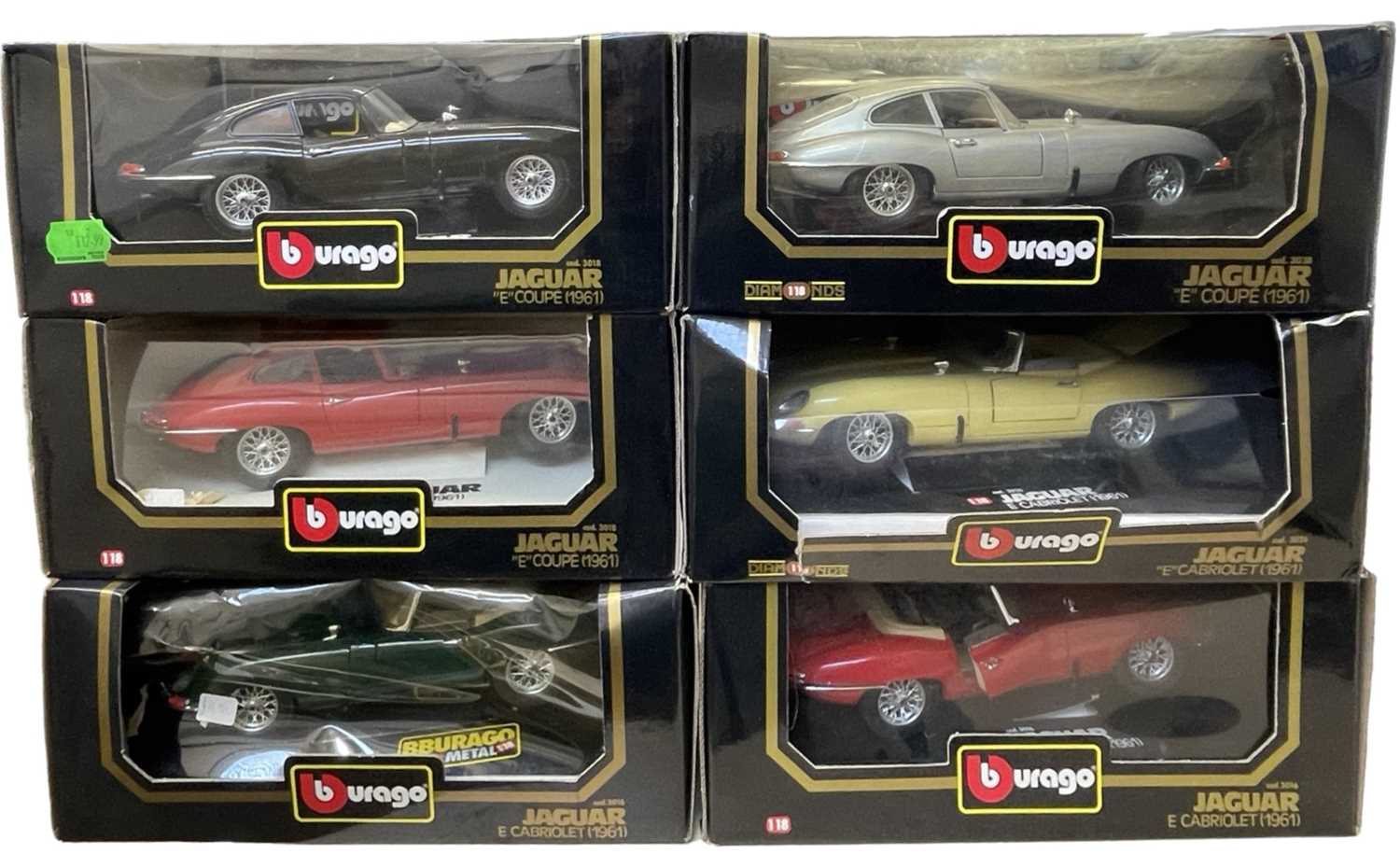 A group of six Bburago 1:18 scale model Jaguars in original boxes, to include: - Jaguar E Coupe (