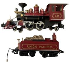 A Bachmann G gauge Union Pacific steam locomotive and wood-loaded tender