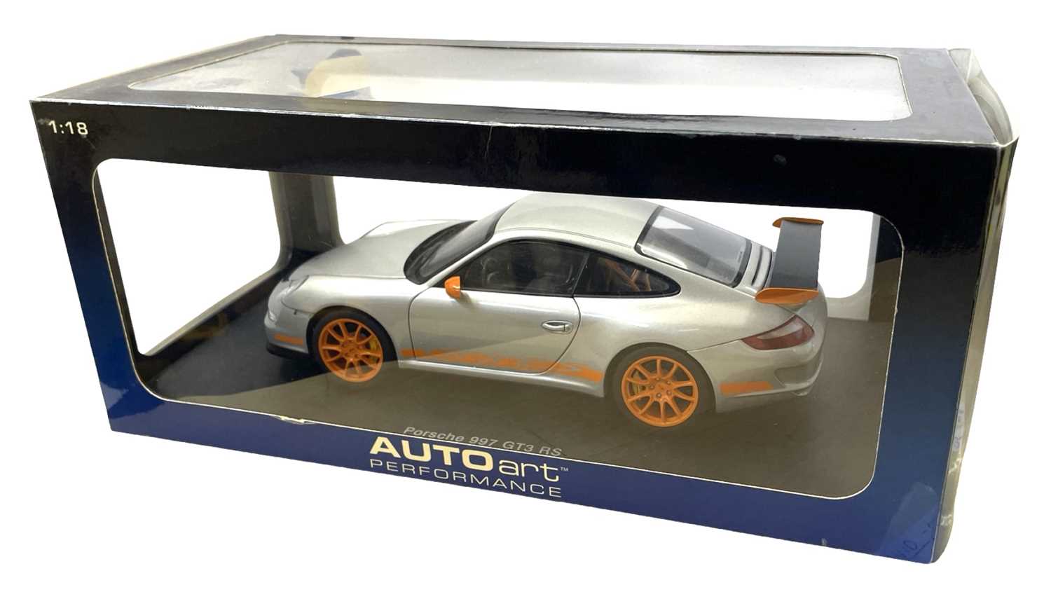 A boxed AutoArt 1:18 scale Porsche 997 GT3 RS in Silver with orange detail