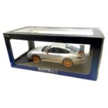 A boxed AutoArt 1:18 scale Porsche 997 GT3 RS in Silver with orange detail