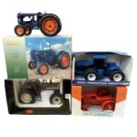 Four boxed die-cast tractor models, to include: - Universal Hobbies Fordson Major E27N - ERTL 9682