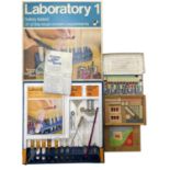 A mixed lot of vintage toy sets, to include: - Thomas Salter Laboratory 1 chemistry set - The Flying