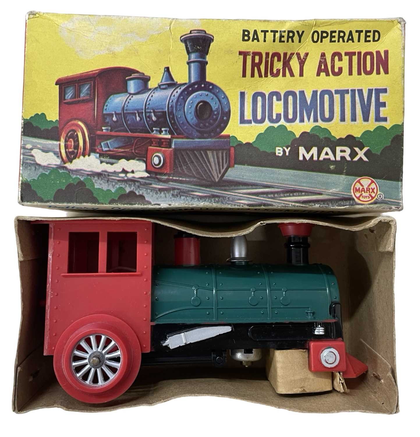 A Marx battery operated Tricky Action locomotive, in original box