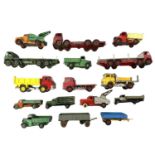 A collection of various die-cast Dinky flatbed trucks