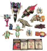 A collection of various 1980s Transformers figures