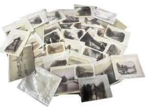 40 original 19th century photographs, corner mounted to card. Various sizes and locations