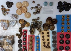 A quantity of assorted buttons to include jet, carved bone, military, enamel, metal and others