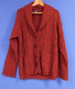 A ladies Paul Costello dressage wool and mohair cardigan with wide revere collar, patch pockets