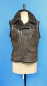 A lady's Ralph Lauren Polo brown leather and sheepskin gillet, with asymetric front zip, zip and
