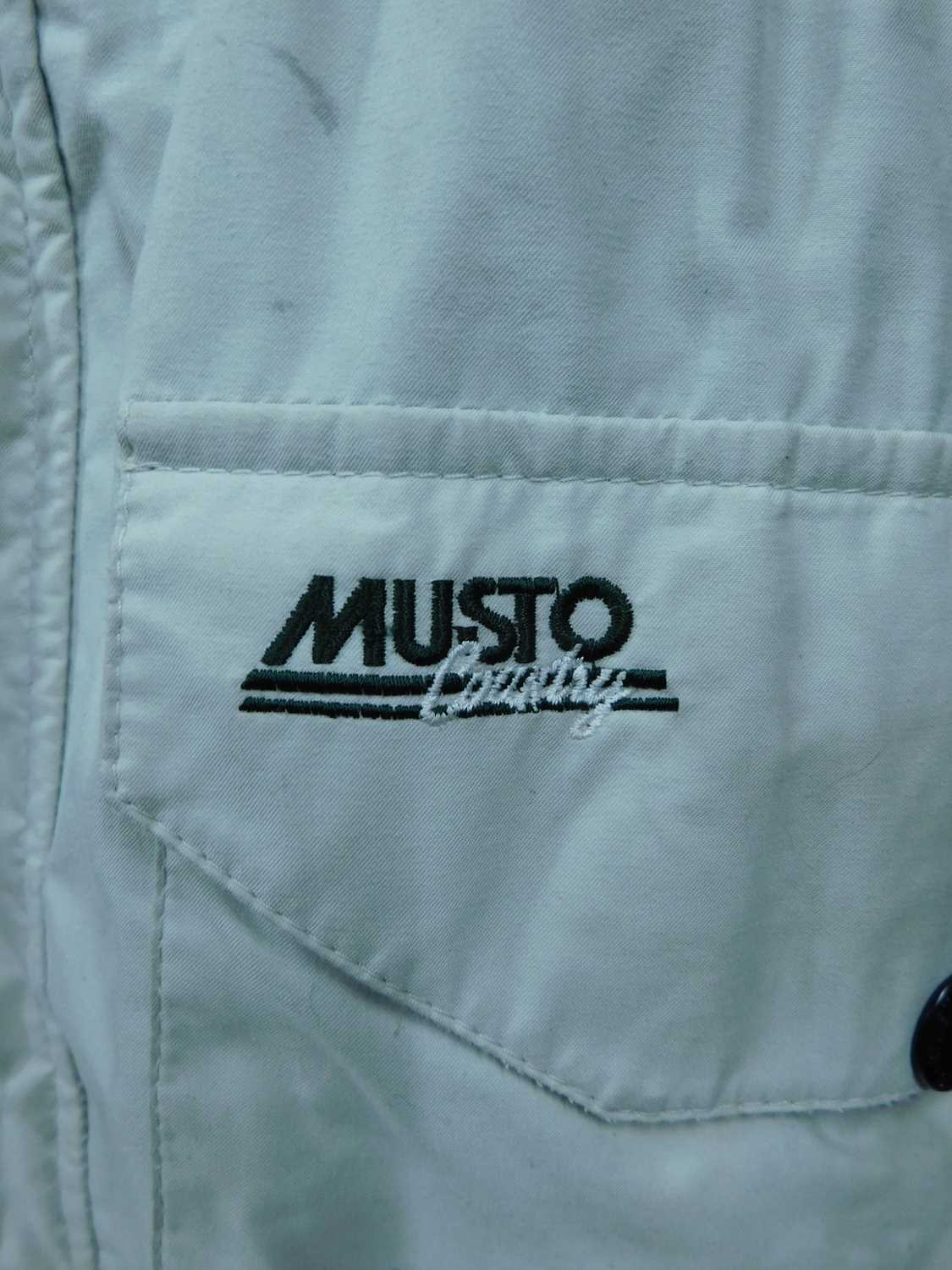Two Musto overcoats, to include a lady's beige Musto Country raincoat, single breasted with zip - Image 5 of 14