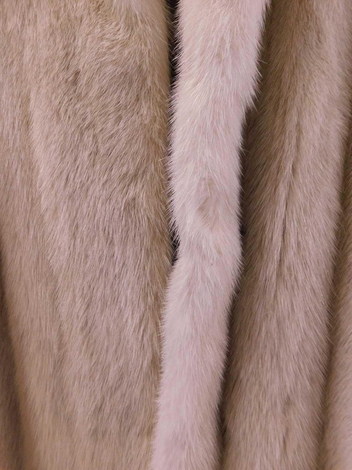 A lady's full length cream fur coat by Hurtiq Ltd overall good with no obvious signs of wear or - Image 7 of 14
