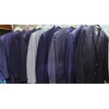 A quantity of menswear to include a blue two piece suit by Timely, a blue three piece suit, navy