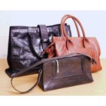 Three lady's handbags, to include a black mock-croc handbag by Jaeger approx. 38cm wide, and two