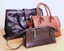 Three lady's handbags, to include a black mock-croc handbag by Jaeger approx. 38cm wide, and two