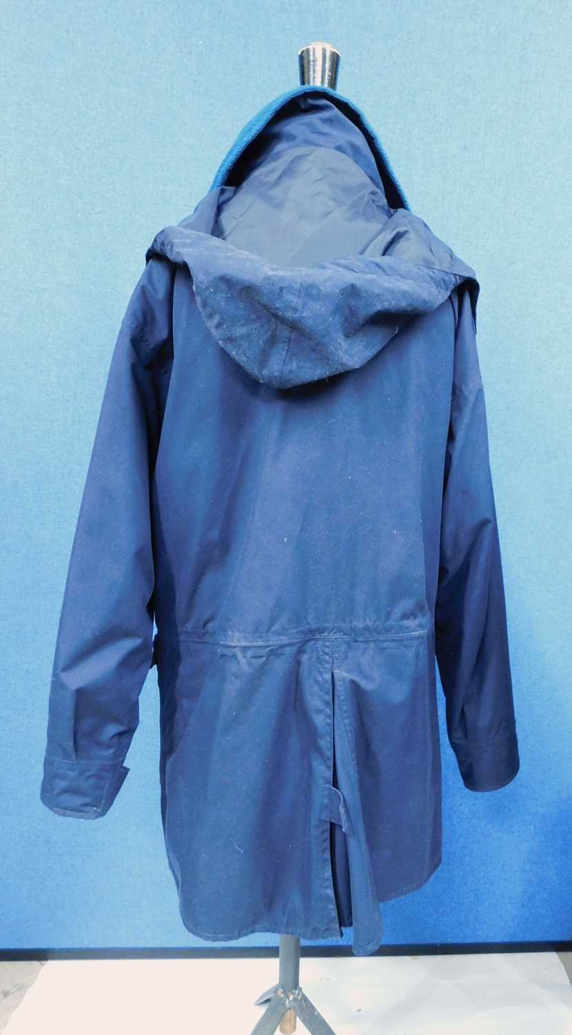 Two Musto overcoats, to include a lady's beige Musto Country raincoat, single breasted with zip - Image 9 of 14