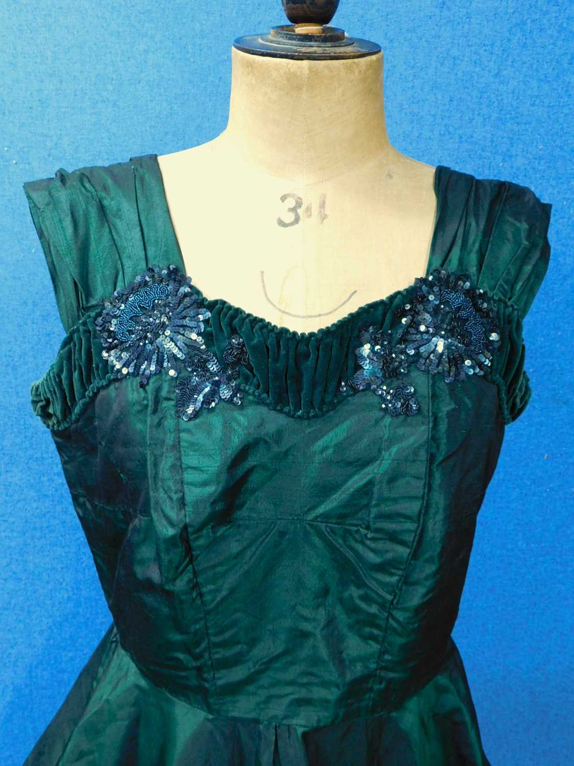 An emerald green satin evening gown with velvet and sequin trim, wide shoulder straps and full skirt - Image 2 of 5