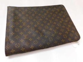 A Louis Vuitton travel sleeve / laptop case for The Concours D'Elegance, Stowe, July 28th 1990,