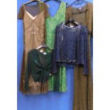 A quantity of lady's wear to include a green embroidered dress by Coast, size 16, a sleeveless V