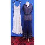 A navy blue chiffon heavily beaded dress with matching tie belt, together with a cream cotton