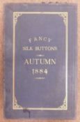 A late Victorian tradesman's four fold cased set of sample buttons, 'Fancy Silk Buttons, Autumn