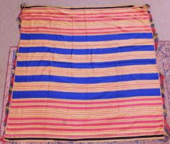 A Macclesfield silk scarf/shawl, in red, yellow, blue and black stripes, fringed to two sides,162