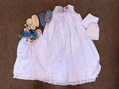 A quantity of assorted childrens clothes, a christening gown, shoes and harness