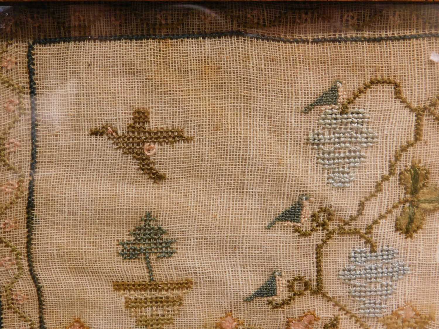 A Georgian needlework sampler, with flowers, foliage, birds and rabbits, named 'Jane Egar, Wisbeach, - Image 4 of 5