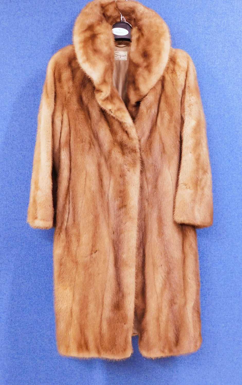 A lady's three quarter length fur coat by Simpsons Fur Salon