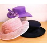 Three occasion wear hats, to include a pink straw and net hat, a lavender and floral net decorated