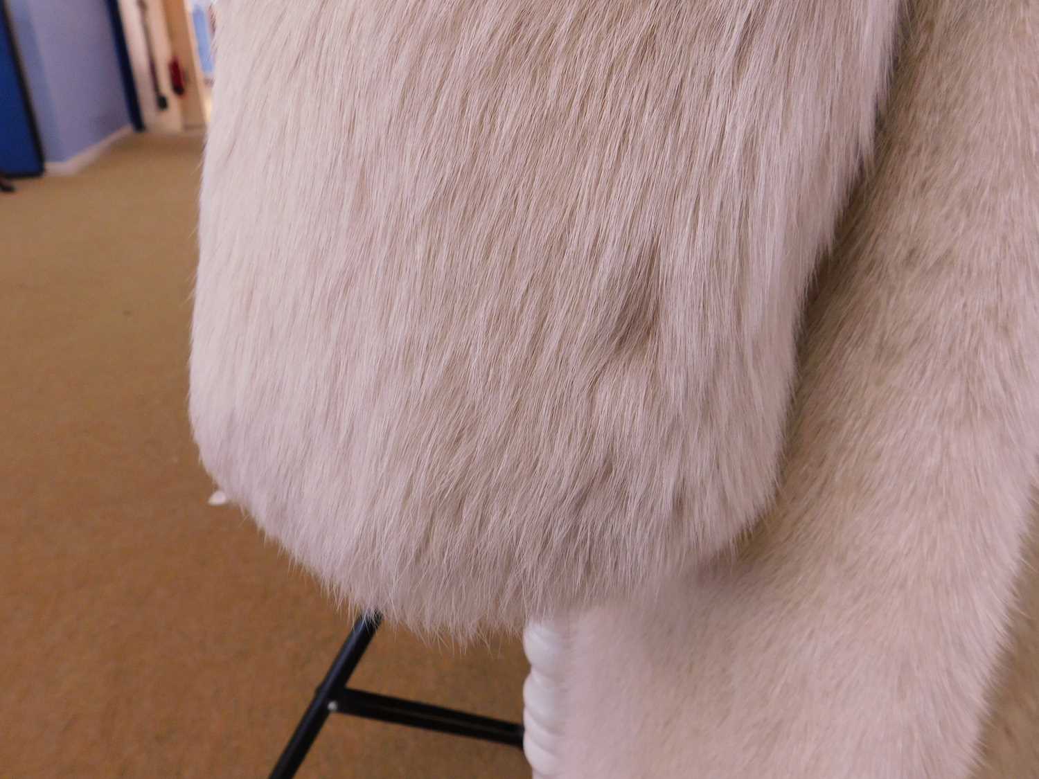A lady's full length cream fur coat by Hurtiq Ltd overall good with no obvious signs of wear or - Image 11 of 14