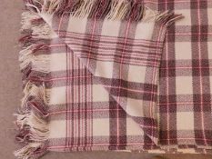 A Welsh blanket, in cream, brown and red check, fringed edging on two sides, approx. 200 x 220cm