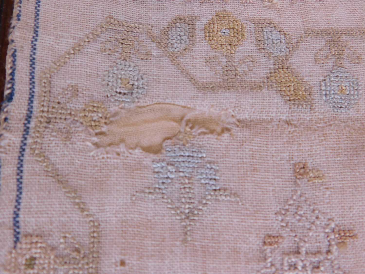 A Georgian needlework sampler, with rows of religious text, animals and buildings, named 'Ann - Image 6 of 6