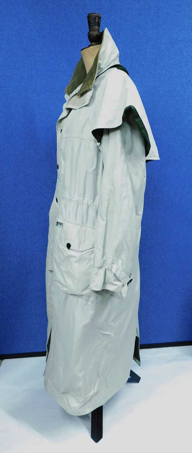 Two Musto overcoats, to include a lady's beige Musto Country raincoat, single breasted with zip - Image 2 of 14