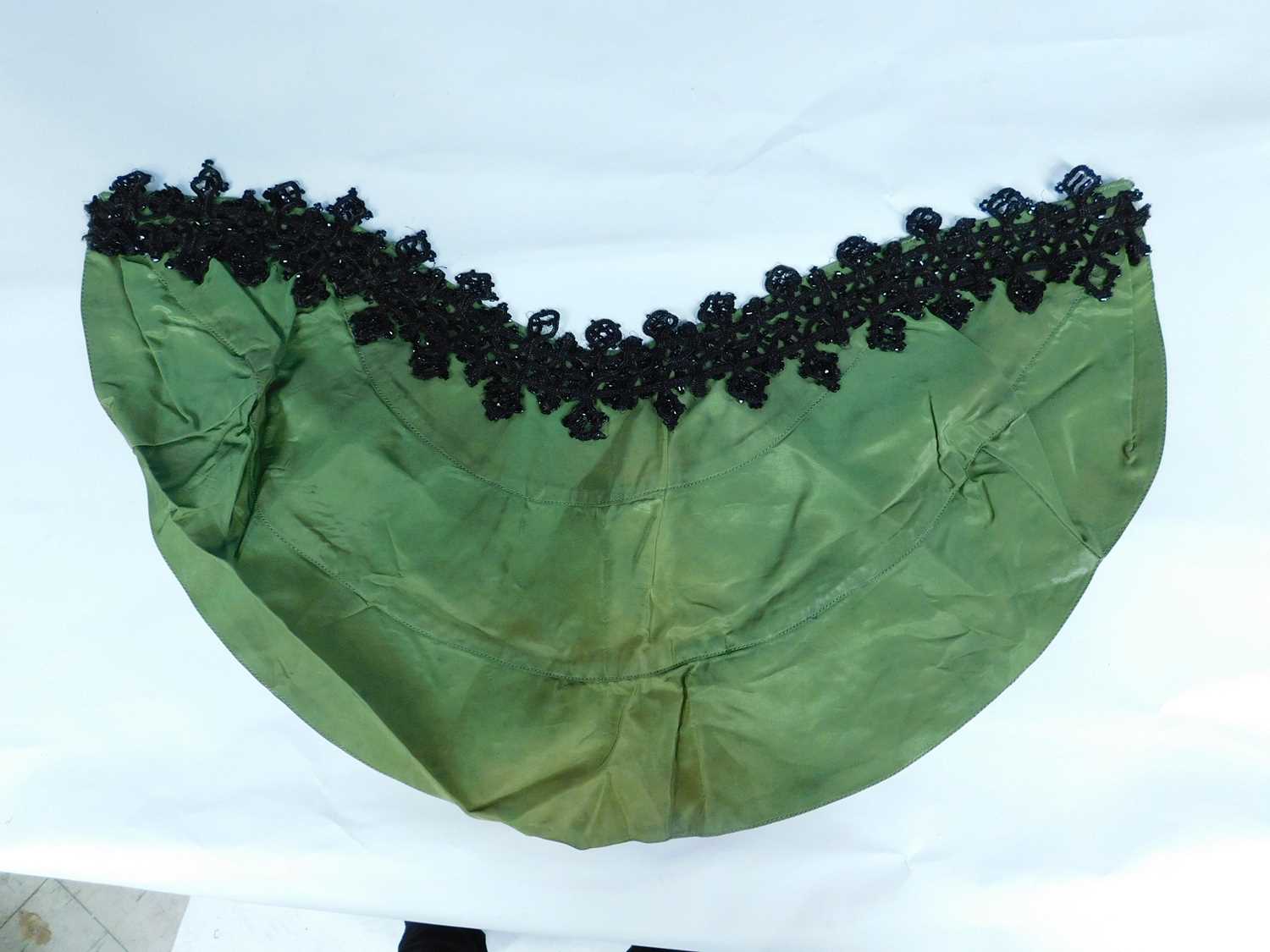 A late 19th/early 20th century children's cape, the olive green silk arc with tailored shoulders - Image 4 of 4