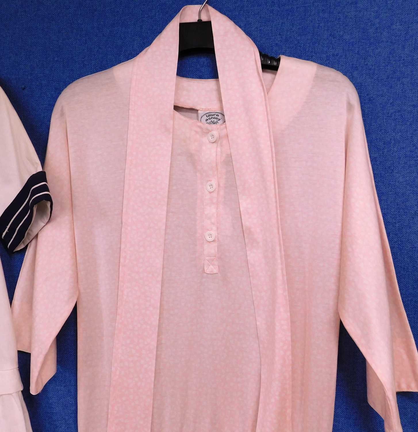 Two Laura Ashley dresses to include a cream and navy blue sailor dress and a pink and white - Image 3 of 9