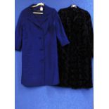 Two ladies mid 20th Century coats to include a navy blue single breasted coat by Eve Valere and a