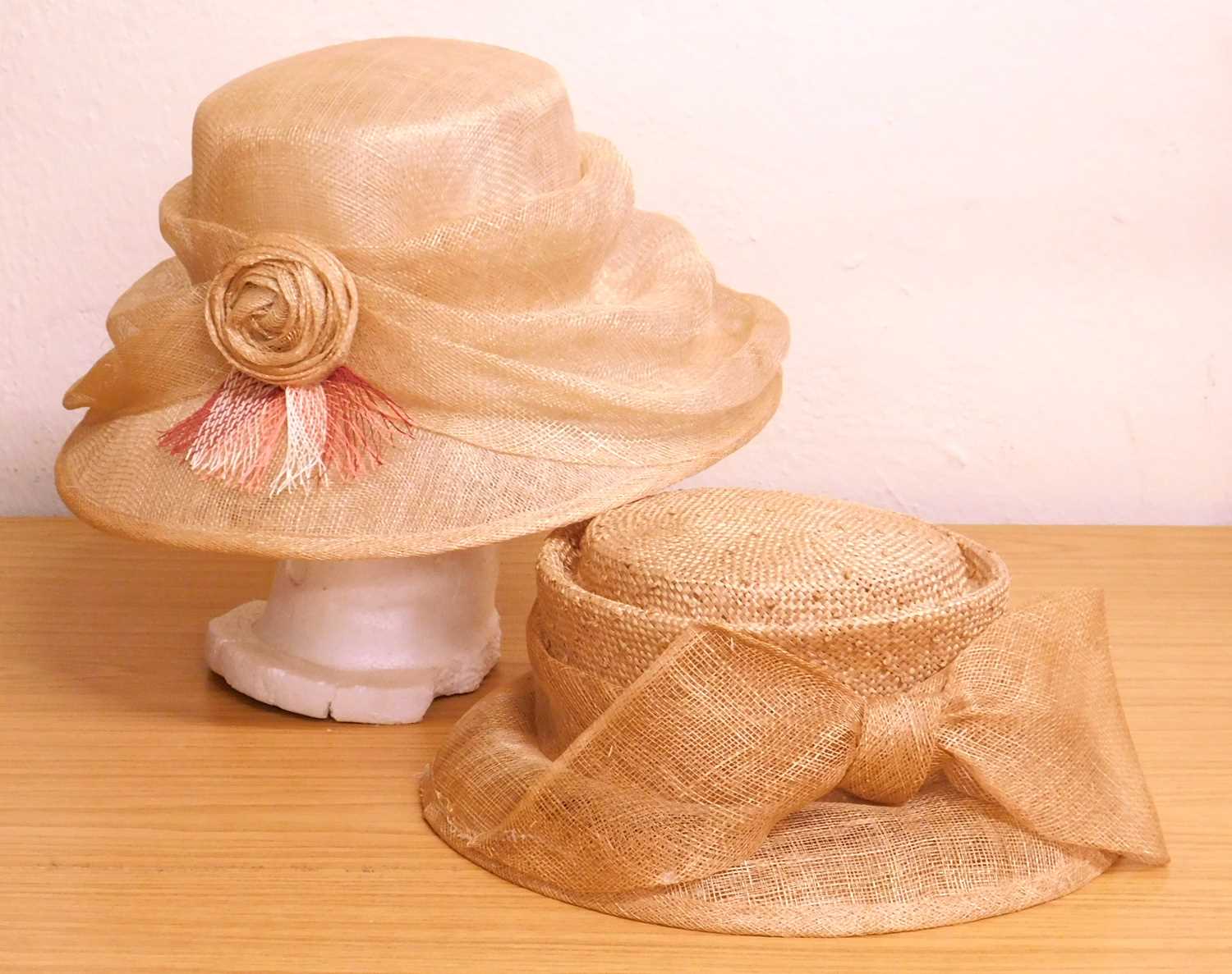 Two occasion wear hats, to include a straw hat by Gina Bacconi and a straw hat with straw mesh