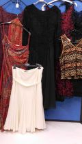 A quantity of lady's wear to include a black round necked and red embroidered overlay dress by Phase