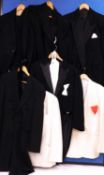 A quantity of gentleman's evening wear to include tailcoats, dinner jackets, waistcoats, etc, (