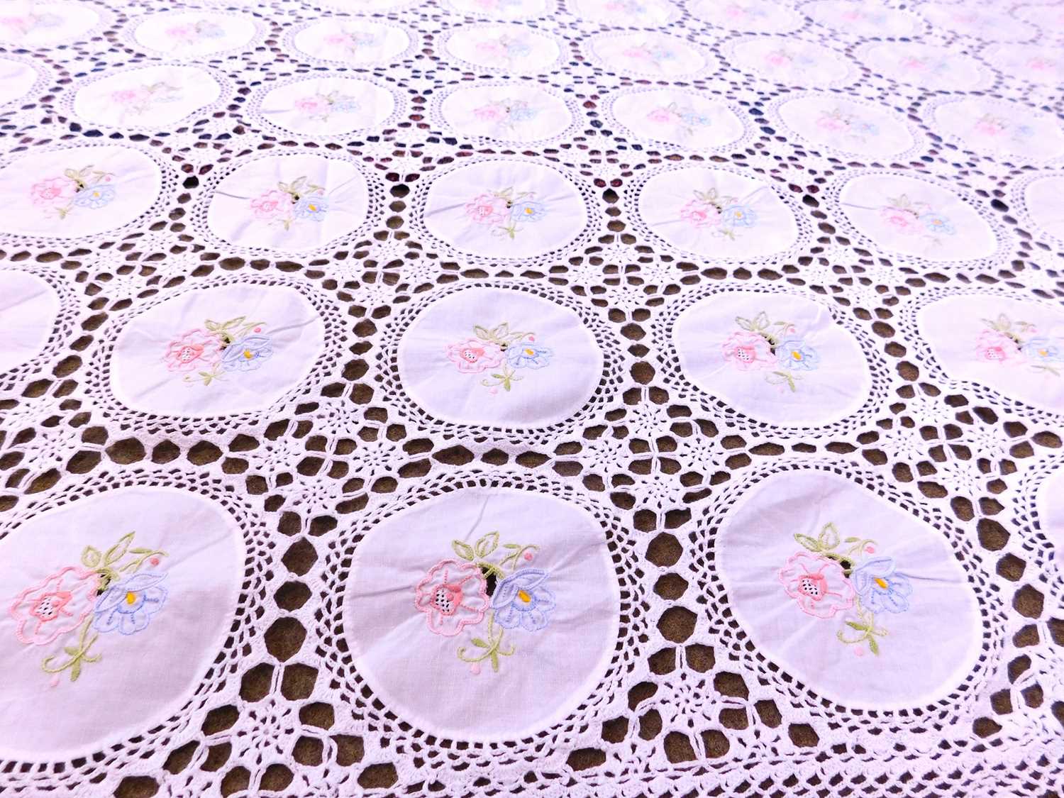 A cotton machine embroidered and crocheted lace bedspread, approx. 260 x 170cm, together with a